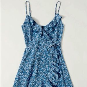 Ruffle trim wrap side tie mini dress